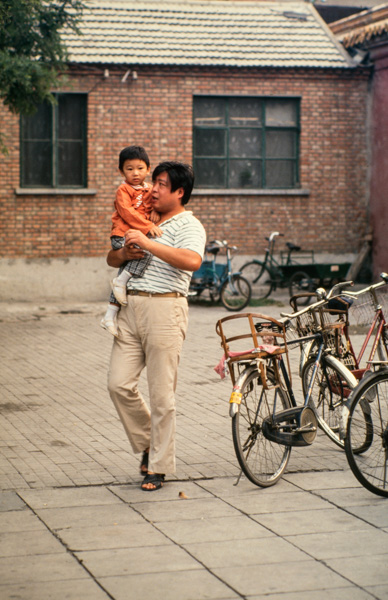 Man takes son into kindergarten, Beijing