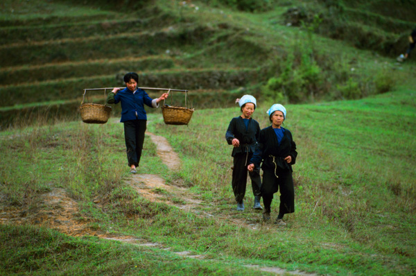 Women on hills near Peace Village