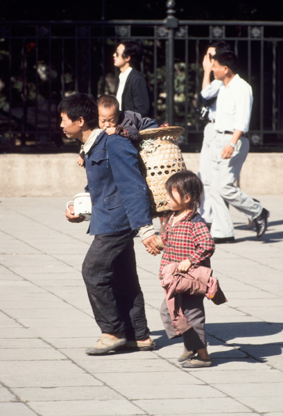 Man with two children, Beijing