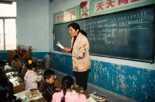 Teacher and students in classroom, Beijing