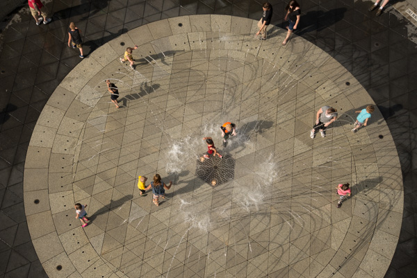 People play in fountain