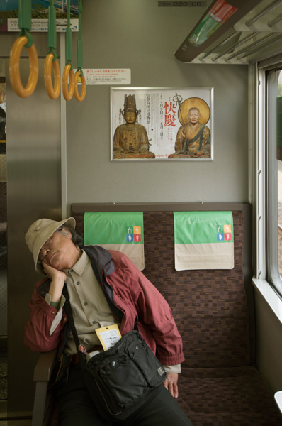 Man asleep on train, Kyoto