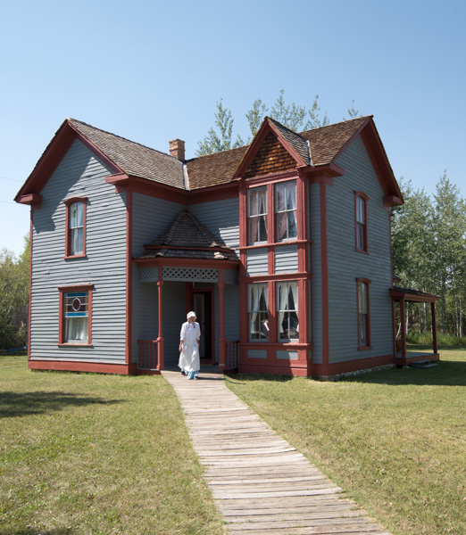 Reenactor and historic house