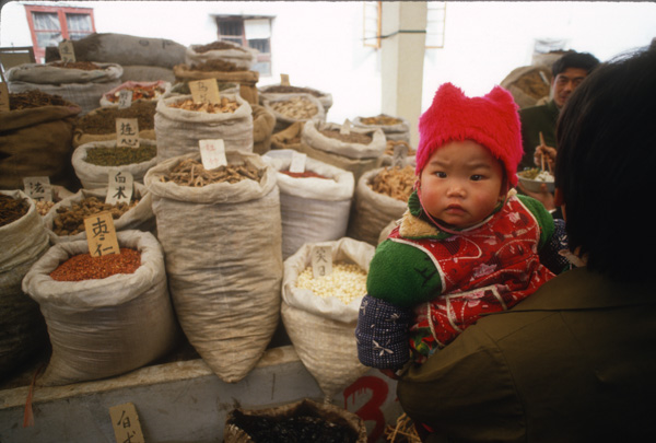 Child in market, Changsha, China