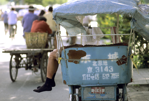 Man sleeps in pedicab